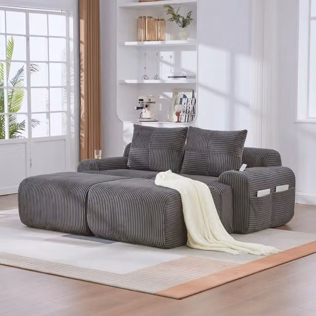 Divano angolare a L Mivray in velluto a coste grigio con pouf coordinato e portabevande L/P/H: 200 x 174 x 80 cm