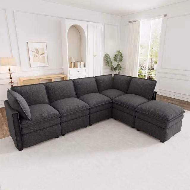 Divano modulare REDOM con funzione letto, pouf coordinato e forma a L, rivestimento in tessuto grigio, L/P/H: 344 x 127 x 91 cm