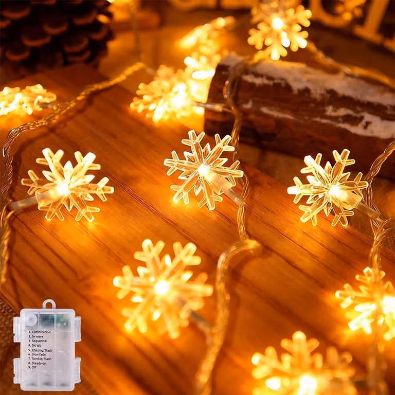 Catena luminosa a LED a forma di fiocchi di neve, 6 metri, 40 luci, alimentata a batteria, luce bianco caldo
