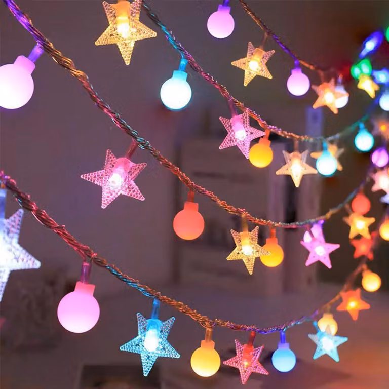 Catena luminosa con decorazioni a forma di stella, lunghezza 3 metri, 20 LED, multicolore, alimentata a batteria