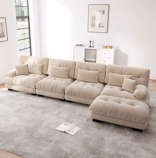 Divano modulare MODFU a 4 posti con ottoman mobile e cuscini coordinati, configurazione angolare o lineare reversibile, rivestimento in tessuto color beige o marrone