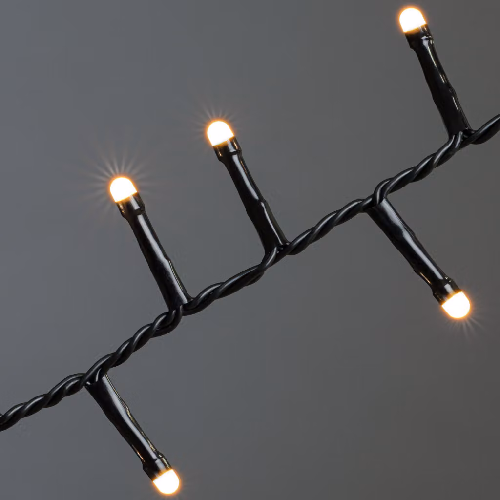 Konstsmide Micro LED Compactlights, smerigliato, 2000 diodi color ambra, 30V, per esterni (IP44), cavo nero - 3872-830