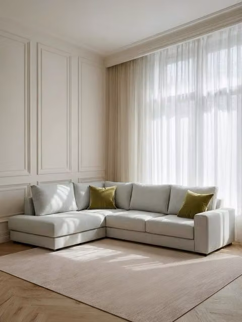 Divano angolare Orson Kenay Home, modello a media sinistra, colore perla, design moderno in tessuto con cuscini inclusi
