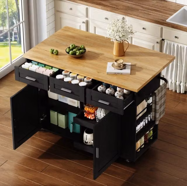 Isola cucina pieghevole 120x70x84 cm in MDF con 3 cassetti; 2 organizer; prese e ruote