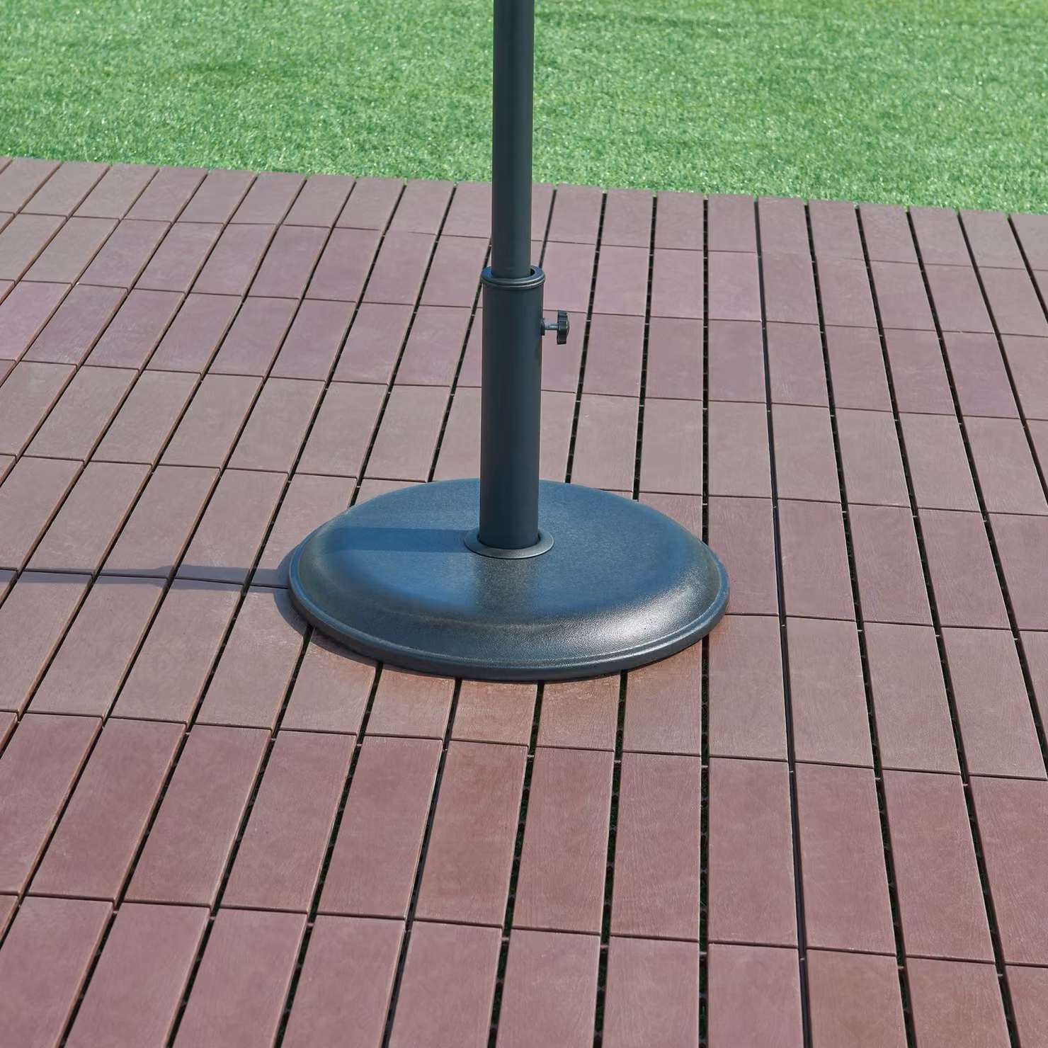 Supporto per ombrellone 'Bionaz' Ø45x5 cm cemento 15 kg rotondo nero