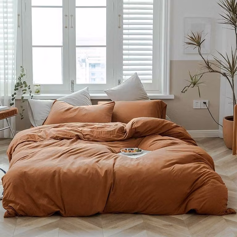 Solidchoice - Set di lenzuola con copripiumino in cotone jersey color ruggine, comprensivo di 2 federe