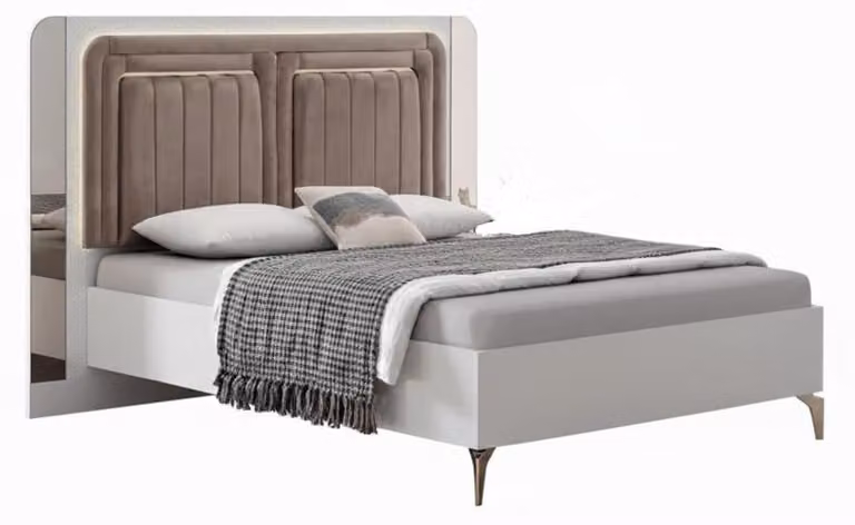Letto elegante dal design moderno, ideale per un riposo confortevole.