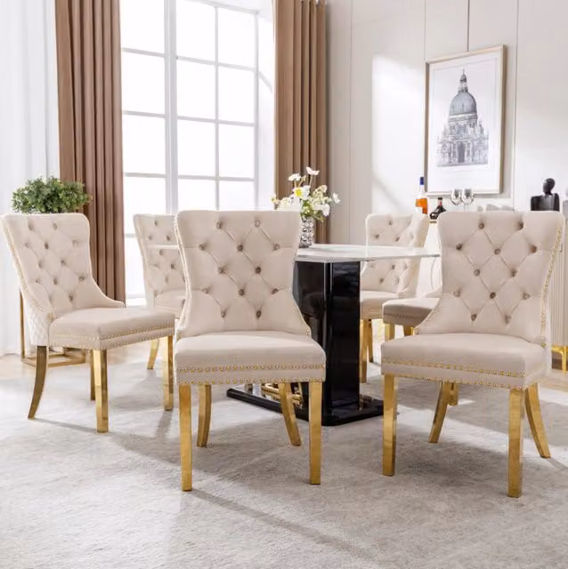 Sedia da pranzo imbottita in velluto beige con gambe in acciaio inox dorato