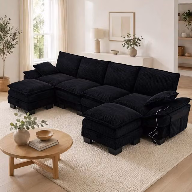 Divano modulare MODFU a 4 posti con 2 pouf, design moderno a L con ricarica USB-C, rivestimento in velluto a coste nero, L/P/H: 330 x 132 x 84 cm