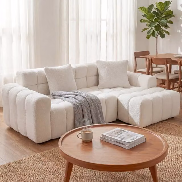 Divano angolare convertibile a L; stile moderno; colore bianco
