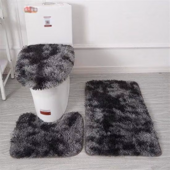 Set di tre elementi antiscivolo per il bagno dal design morbido, con profili a forma di U, tappetino assorbente e copriwater con laccio, verniciato nero