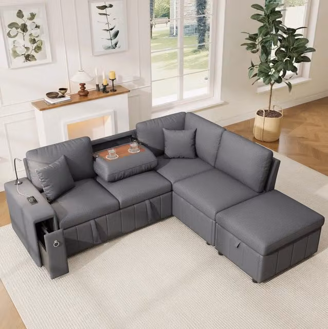 Divano angolare L trasformabile in letto 213x184x88 cm in lino grigio con luce lettura e USB