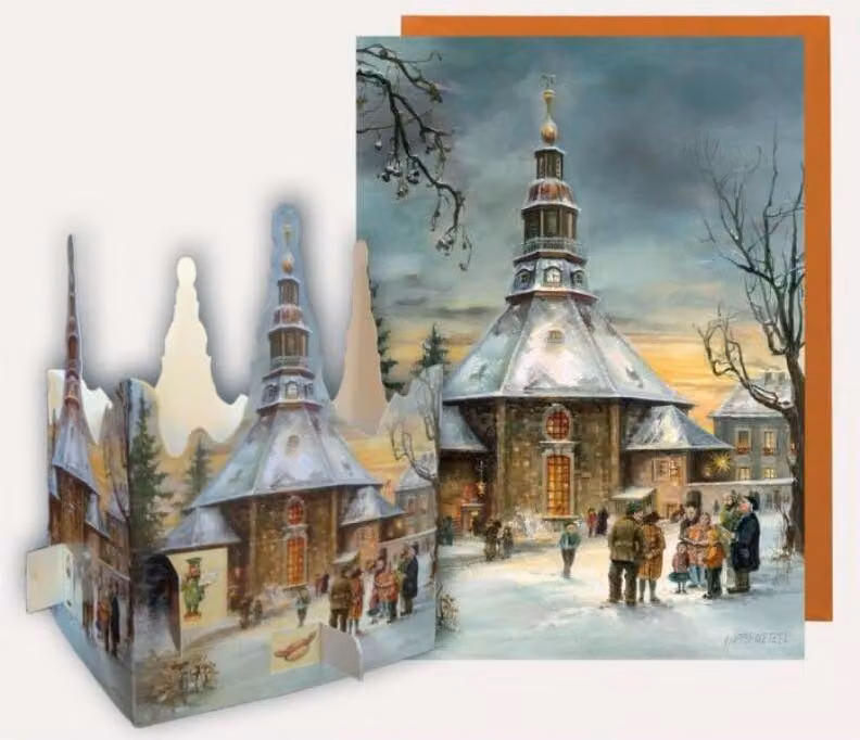 Calendario dell'Avvento da tavolo con la chiesa di Seiffen e cartolina dei Monti Metalliferi