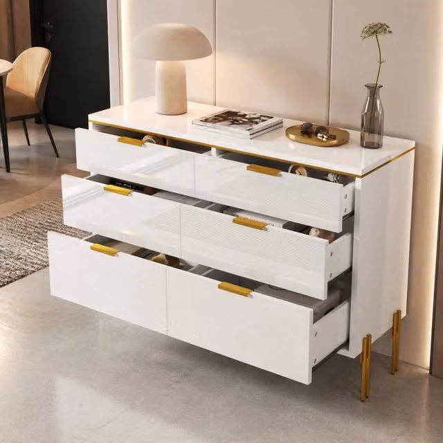 Credenza moderna con 6 cassetti in finitura lucida bianco e oro, L/P/H: 120 x 40 x 85,5 cm