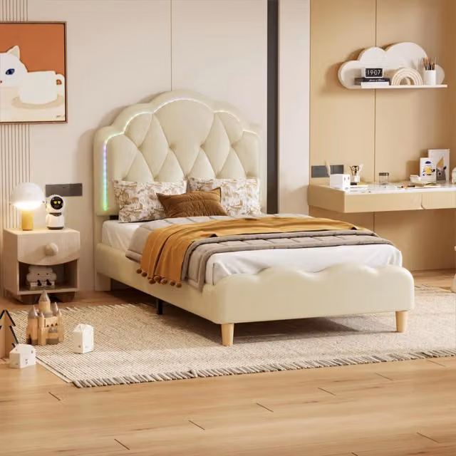 Letto singolo imbottito OKWISH con testiera ondulata e striscia LED multicolore, rivestimento in similpelle beige, L/P/H: 90 x 200 x 107,5 cm