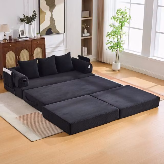 Divano modulare ULEVR 200x190 cm in velluto a coste nero con ottomana, tasca laterale e 3 cuscini