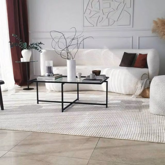 Tavolino da salotto Anna DMORA con piano in vetro nero e trasparente, L: 94 cm, P: 64 cm, H: 35 cm