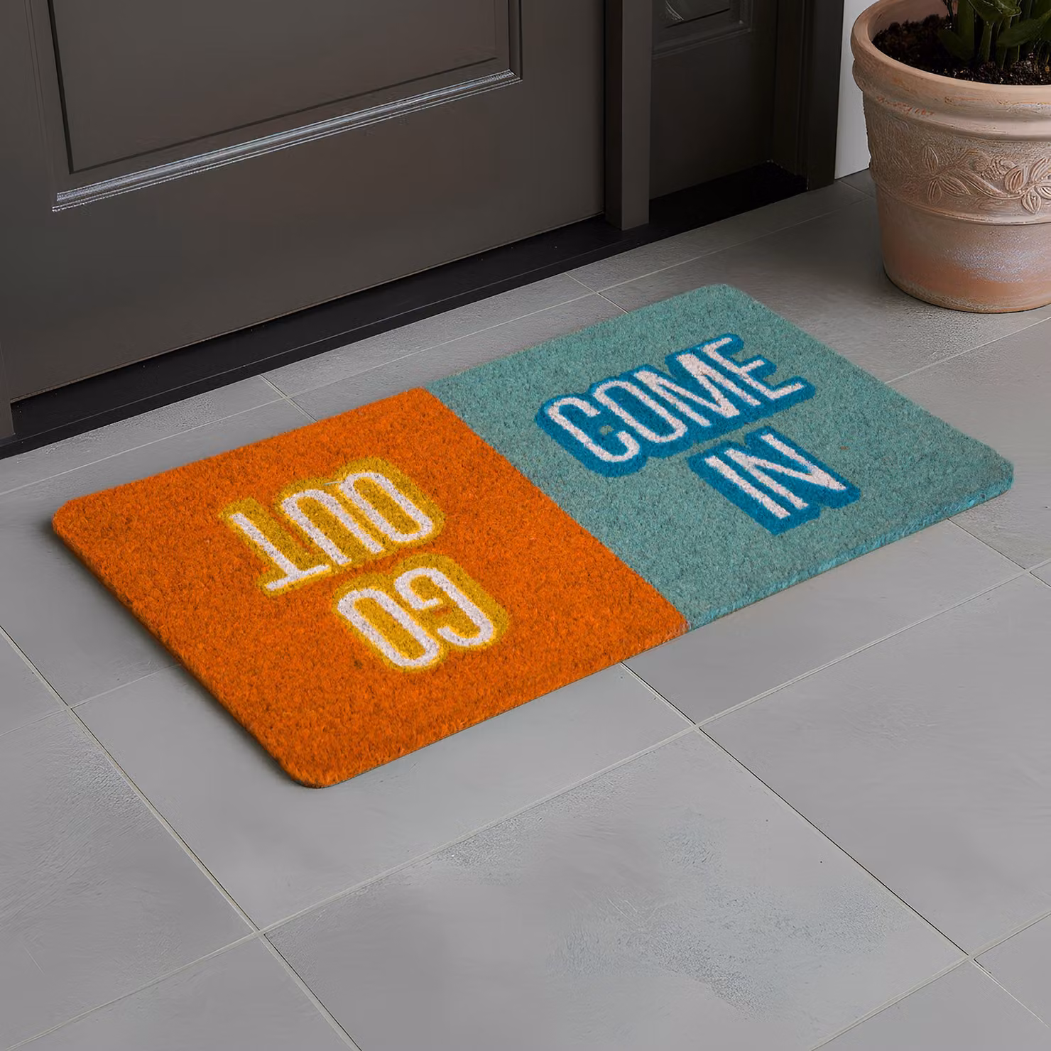 Zerbino rettangolare Zerbinomania arancione e blu con design grafico moderno, antiscivolo e antipolvere, L: 70 cm, P: 40 cm