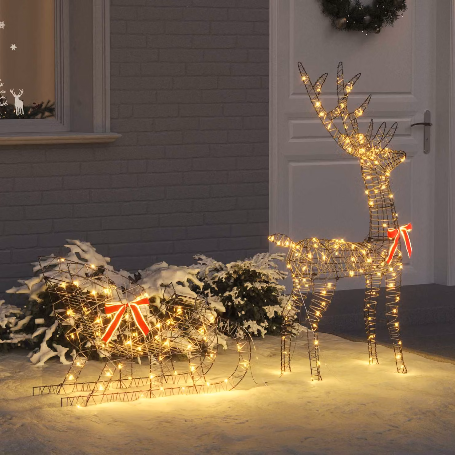 Slitta trainata da renna vidaXL in rattan con luci LED bianco caldo L: 70 cm, P: 26 cm, H: 129 cm