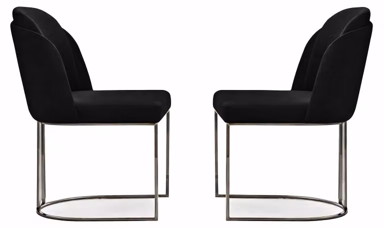 Due eleganti sedie da pranzo nere con base cromata e design