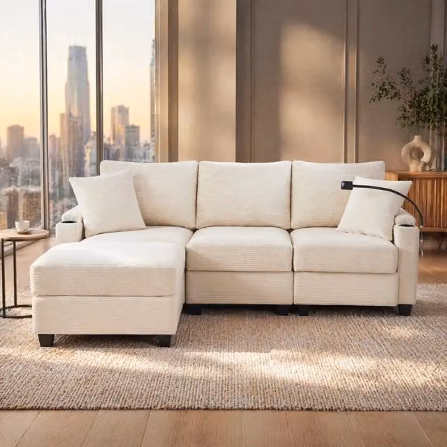 Divano angolare FOLYNA da 3 a 4 posti in velluto a coste beige con pouf mobile, ricarica USB e cuscini inclusi, L/P/H: 213.5 x 139 x 87 cm – 1
