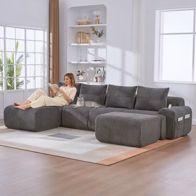 Divano modulare a L OKWISH in velluto a coste grigio con portabicchieri per soggiorno