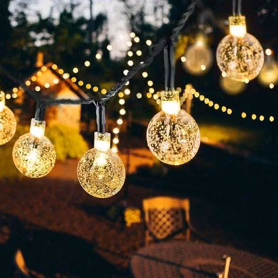 Ghirlanda luminosa impermeabile da 50 LED per il giardino con sensore di luce