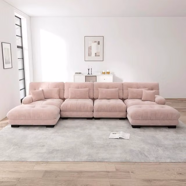 Divano angolare 4 posti Minimal rosa in tessuto chenille con poggiapiedi coordinato e design reversibile