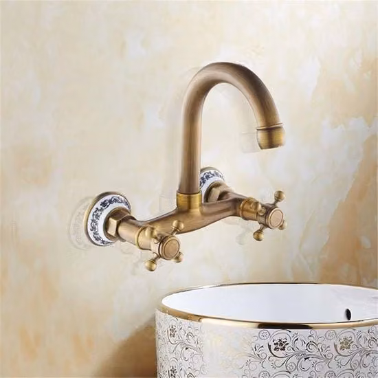Wandbadkraan per acqua calda e fredda con 2 maniglioni e rubinetto per doccia a manovella