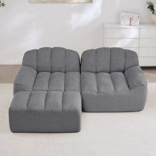 Divano angolare modulare senza struttura con pouf e seduta ampia in pile granulato grigio 210 × 165 × 79 cm