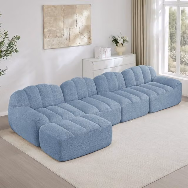 Divano modulare 4 posti con ottomana collegabile; senza struttura in pile granulare blu