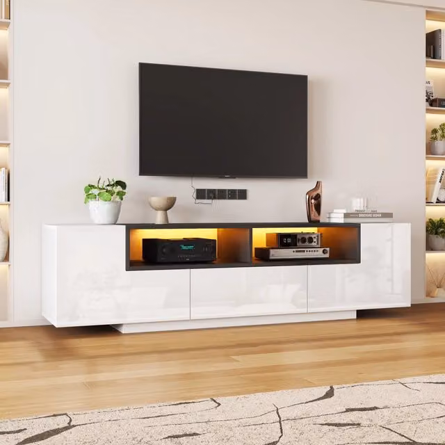 Mobile TV 180x40x48 cm, bianco lucido e nero, con LED, cassetti e design a L. Per TV fino a 75 pollici.