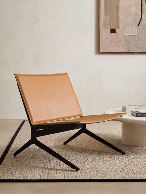 Poltrona Cooper Kenay Home in pelle marrone e nera con braccioli per soggiorno