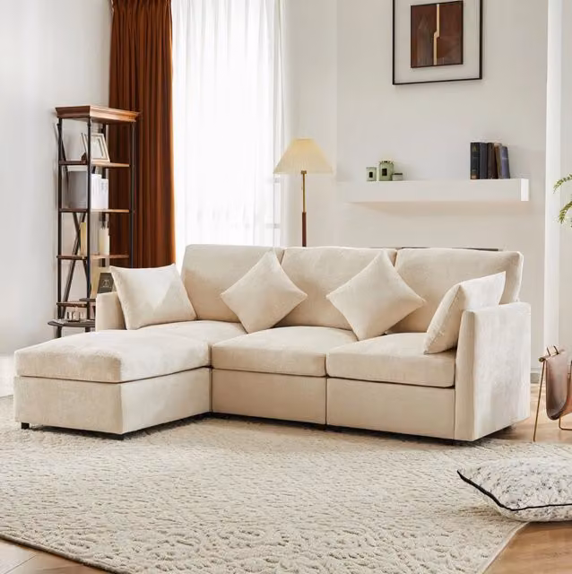 Divano angolare modulare 216x161x81 cm in chenille beige con pouf mobile e 4 cuscini –