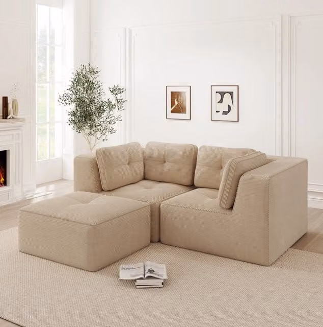 Divano angolare modulare in velluto a coste beige con moduli riconfigurabili e base antiscivolo
