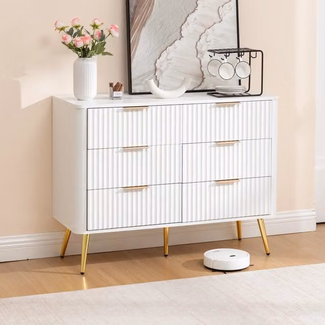 Cassettiera Mivray con 6 cassetti a chiusura ammortizzata in MDF bianco con maniglie in metallo e gambe rialzate da 20 cm