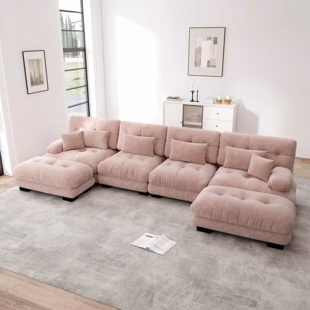 Divano modulare angolare a U OKWISH in ciniglia rosa con pouf e cuscini per soggiorno