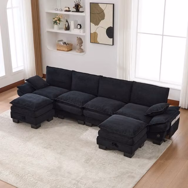 Divano modulare a L da 4 posti OKWISH in tessuto corduroy nero con cuscini spessi, porta USB-C e tasche laterali L/P/H: 330 x 132 x 84 cm