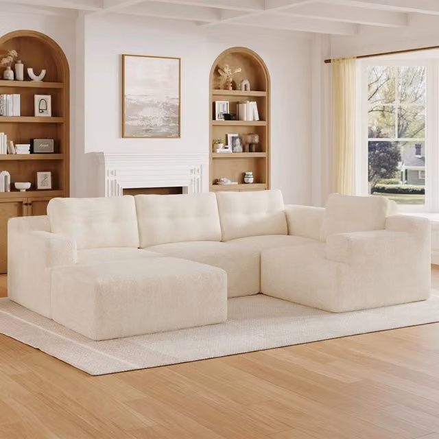 Divano modulare a U 252 x 180 x 82 cm in chenille beige; con pouf