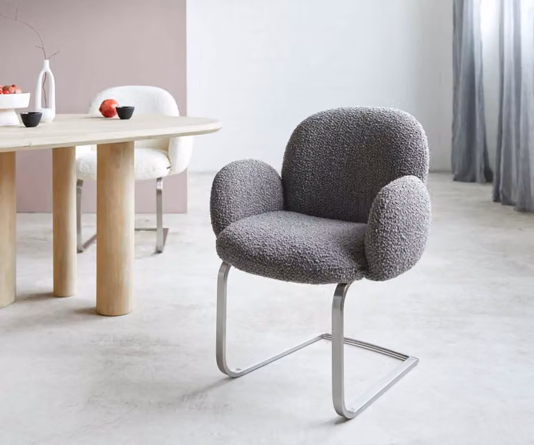 DELIFE Sedia a dondolo Nube-Flex con braccioli, rivestita in tessuto bouclé color argento-grigio. Sedia a dondolo dal design minimalista, con struttura in acciaio inossidabile e imbottitura in molle insacchettate
