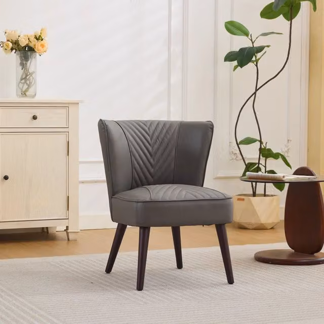 Poltrona lounge OKWISH in vera pelle grigia con struttura in legno di caucciù e design moderno senza braccioli