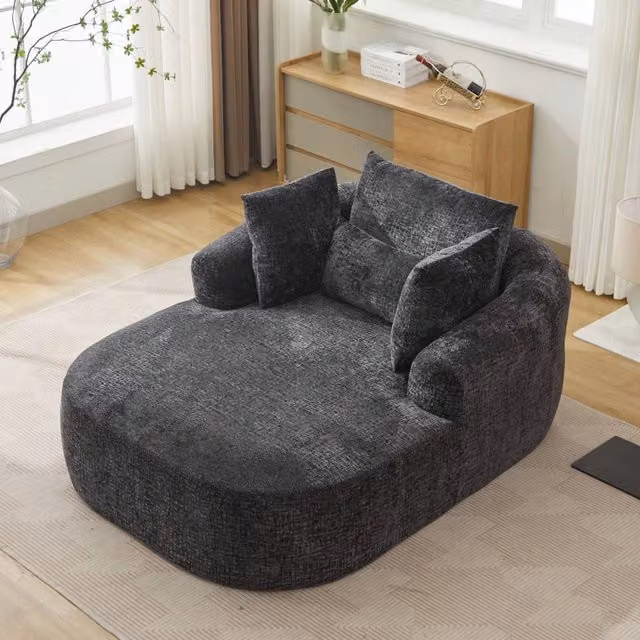 Poltrona letto chaise longue FOLYNA in velluto a coste nero con braccioli imbottiti e funzione ottoman estensibile per il tuo soggiorno