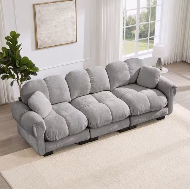 Divano modulare in chenille 260x86x90 cm con cuciture trapuntate; cuscini spessi; grigio chiaro