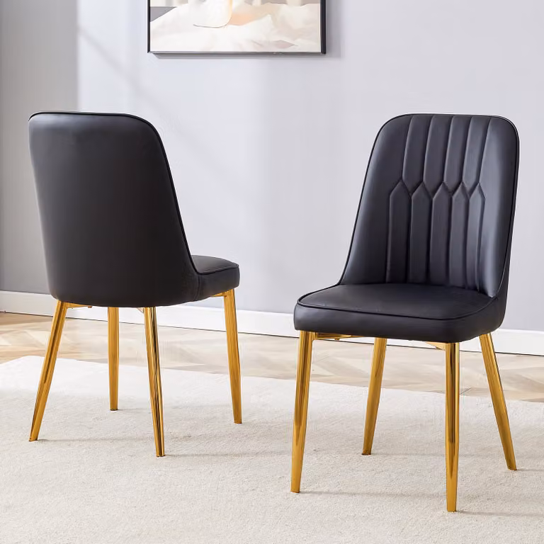 Set di 2 sedie da pranzo, rivestite in ecopelle, con seduta allargata, schienale e gambe in metallo (colore nero e oro)