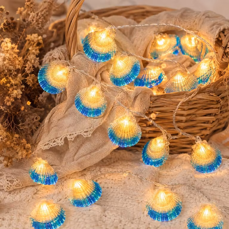 Catena luminosa con conchiglie blu, 10 LED, 1,5 metri, alimentata a batteria