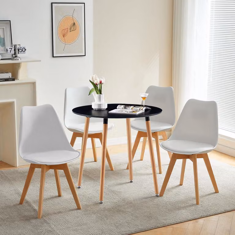 Set da pranzo composto da un tavolo rotondo nero e 4 sedie in legno di faggio bianco