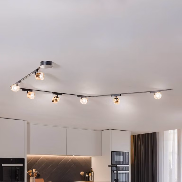 Sistema a binario Lumaro, faretti, 7 luci, oro, Ø 8 cm, 48 V, dimmerabile Lumaro 48V Lindby,, Nero, Soggiorno / Sala da pranzo, Plastica, Moderno