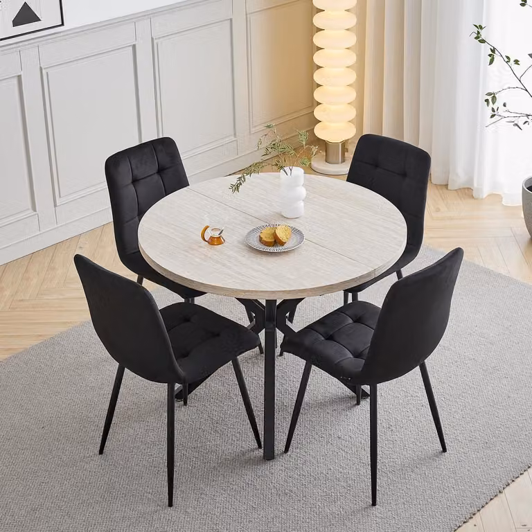 Set tavolo e sedie da pranzo: 1 tavolo, 4 sedie. Tavolo rotondo da pranzo, diametro 100 cm. Colore: giallo "pietra grotta". Rivestimento: velluto nero