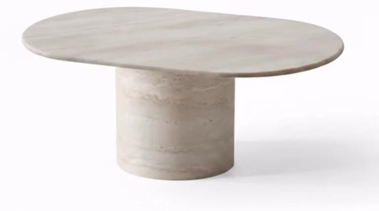 Tavolino da caffè beige, dal design arrotondato. Tavolino da caffè esclusivo. Tavolino per divano