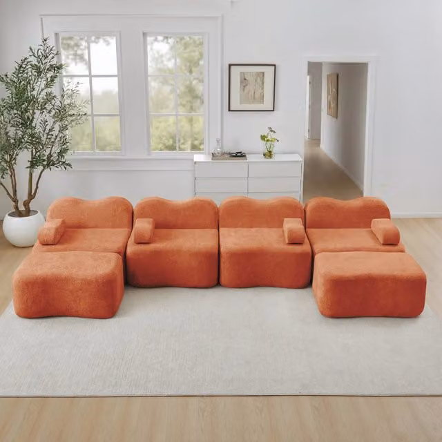 Divano panoramico modulare a U Mivray in velluto arancione con pouf e cuscini coordinati